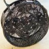 Guadalupe LLC Woven Round Black Purse